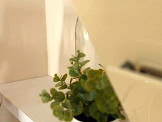 jennifer flex bends over kitchen counter hinting at flexible anal pounding before work