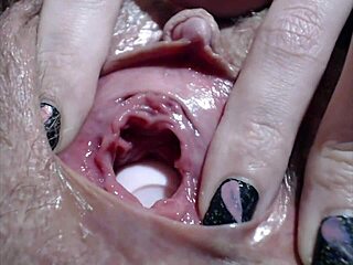 girl crams objects deep into gaping pussy clit for close-up orgasm fetish