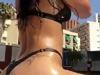 athletic body fitness girl flexes her sexy solo curves