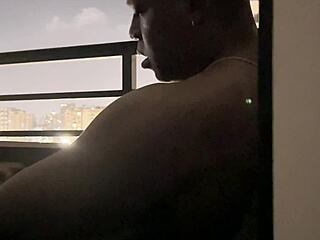 Roommate brunette deepthroats big cock on hotel balcony in amateur couple blowjob