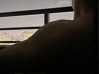 Roommate brunette deepthroats big cock on hotel balcony in amateur couple blowjob