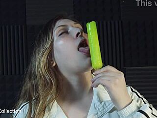 A slobbery wet babe sucks popsicle with fetish mouth sounds in pov asmr