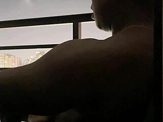 Roommate brunette deepthroats big cock on hotel balcony in amateur couple blowjob