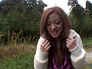 CUTE ASIAN GIRL PUSSY FINGERED OUTDOORS. She sucks hairy dick and gets creamed with big nipples bouncing.