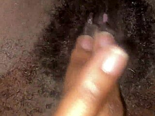 Ebonys juicy pussy drips wet on bed as she masturbates feet up to orgasm.