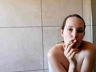 Cute Skinny Girl Smokes Seductively In Bathroom Mirror