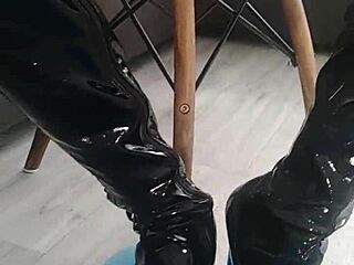 her latex stockings hug those big tits as balloon pops