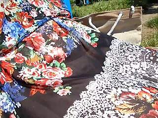 Isn't this hairy mature flashing pussy through transparent dress outdoors?