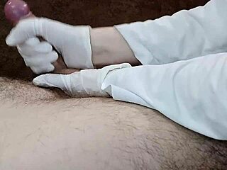 hungarian nurse milks cock with gloved handjob in clinic