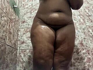 secret camera catches bbw girlfriend's fat ass in see-through red sheer bathroom