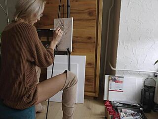 blonde babe in boots glasses paints her pretty pussy flower softcore