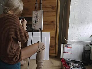 blonde babe in boots glasses paints her pretty pussy flower softcore
