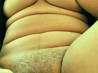 Curvy latina teen stuffs shaved pussy with cucumber to orgasm