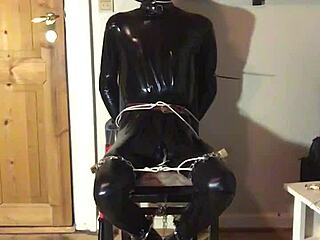 masked latex bondage slut handcuffed for intense fetish play