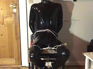 masked latex bondage slut handcuffed for intense fetish play