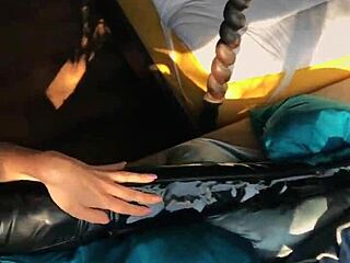 woman in wetlook suit flashes patent leather boots and licks ass teasingly