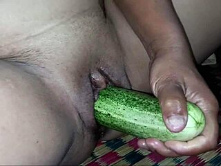 the pretty shaved pussy girl orgasms hard as fruit drills her tight wet hole deep inside