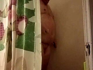 wanna see her stroke that big cock in the shower?