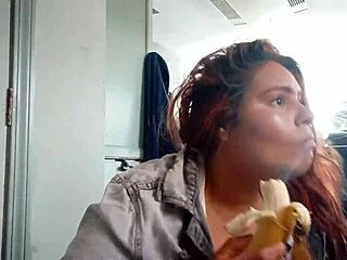 ginger paris teases lips around banana in playful suck