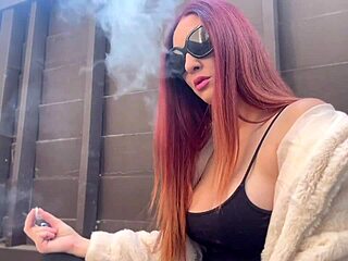 Artemisia Love puffs cig outdoors flashing her huge european milf tits casually