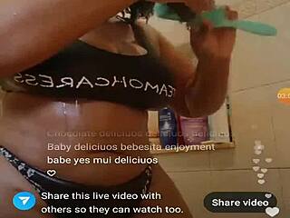 A BLACK EBONY woman steps into the SHOWER, her big ASS glistening wet under the water.