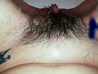 watch me shave my extreme hairy big clit smooth in super close-up