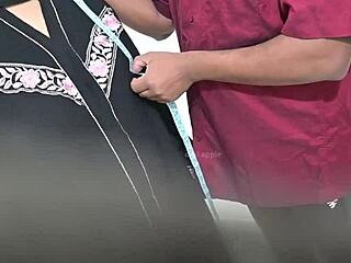 Doctor examines hijab lady in hospital