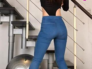 Chinese babe dances seductively in tight jeans