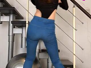 Chinese babe dances seductively in tight jeans