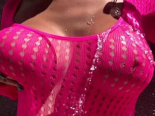 italian milf artemisia flashes juicy tits in outdoor water fun