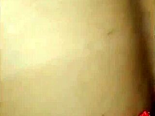 latina sucks cock through gloryhole at swingers house then pulls her inside the booth