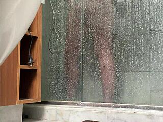 bbw gets busted stroking fat pussy in steamy shower