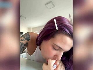 purple haired beauty kneels for deep slow teasing blowjob closeup on huge cock