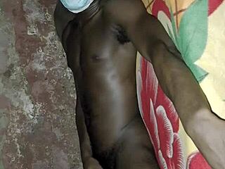 African Black Man Jerks Huge Cock Solo On Bed