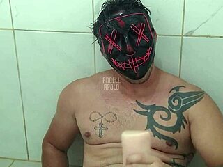 masked tattoo guy showers solo toying ass till cum