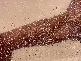 watch petite asian shave smooth in steamy shower?