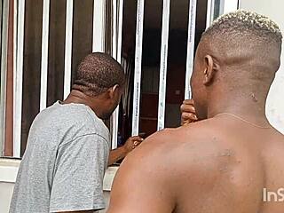 An african mum was feeling her self and her neighbor was peeping at her from the window