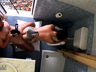 Brunette sucks cock and gets bent over for quick toilet fuck