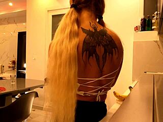 hot tattooed blonde shows meaty pussy in kitchen