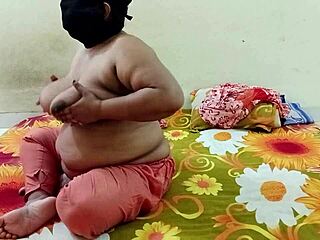 attractive indian bhabhi stands in the village ranch area